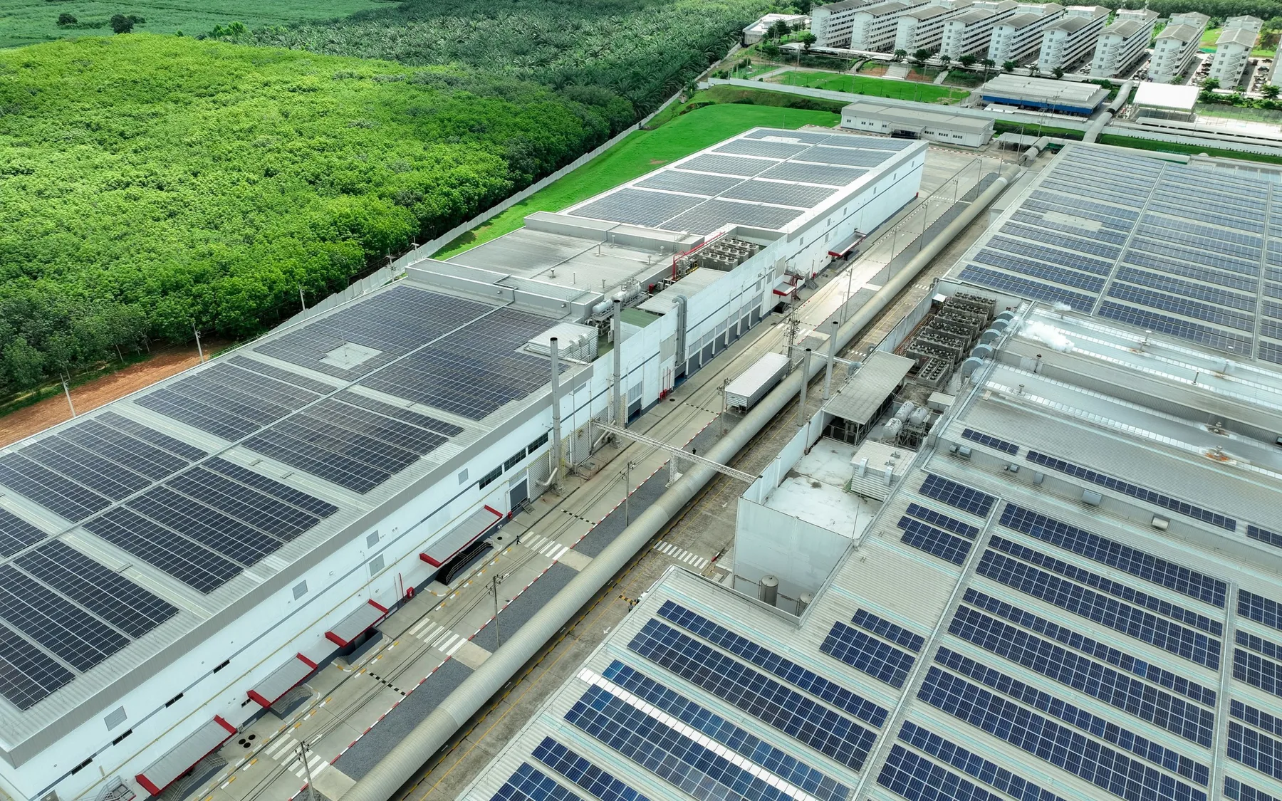 Aerial view of a solar array covering the roof of a commercial building